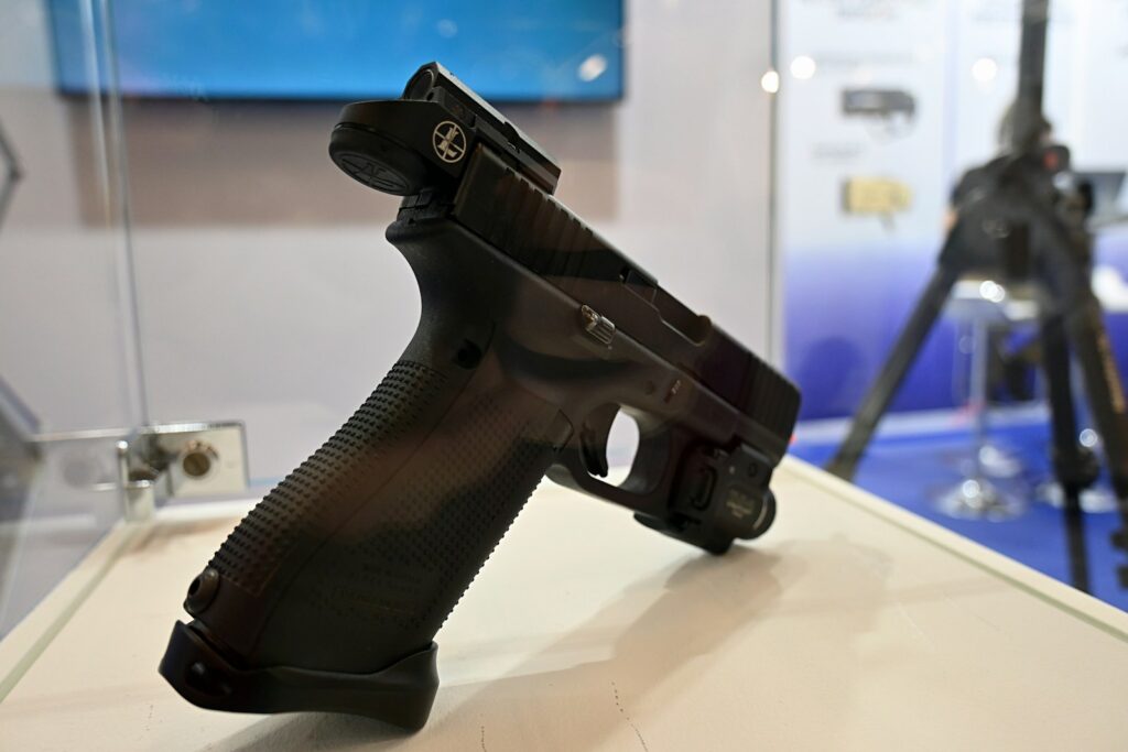 a close up of a gun on a table