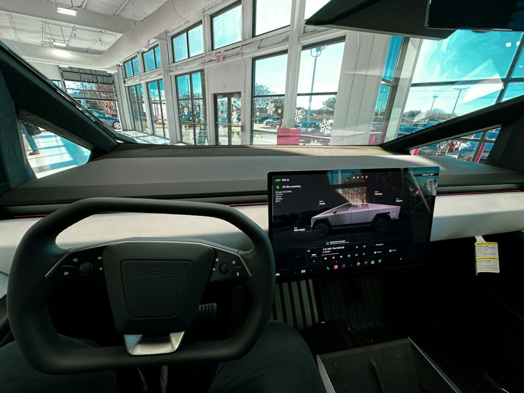 a car dashboard with a laptop on it