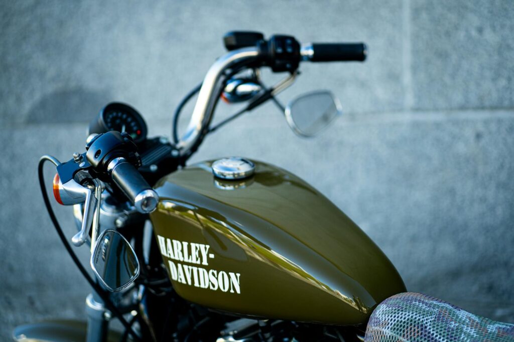 Detailed image of a Harley-Davidson motorcycle's handlebars and fuel tank.