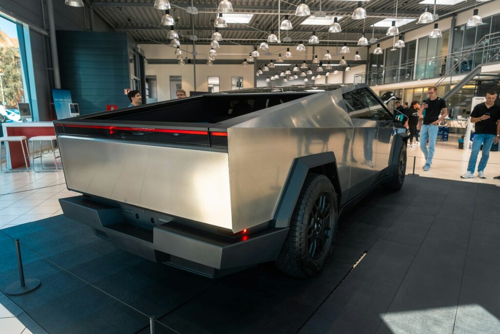 A silver car parked inside of a building