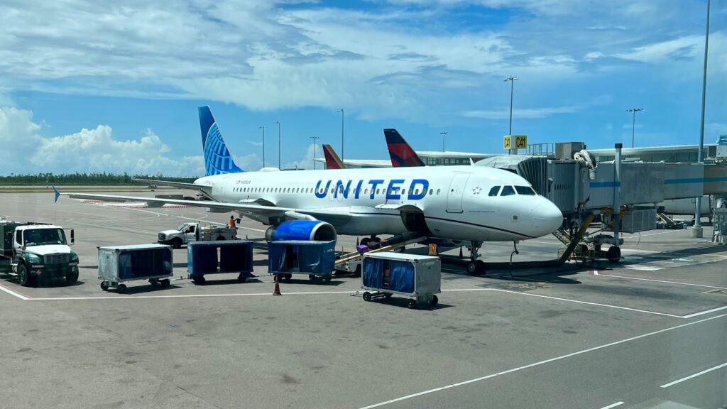 a large jetliner sitting on top of an airport tarmac