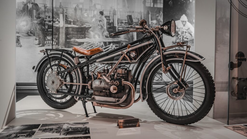 A motorcycle is on display in a museum