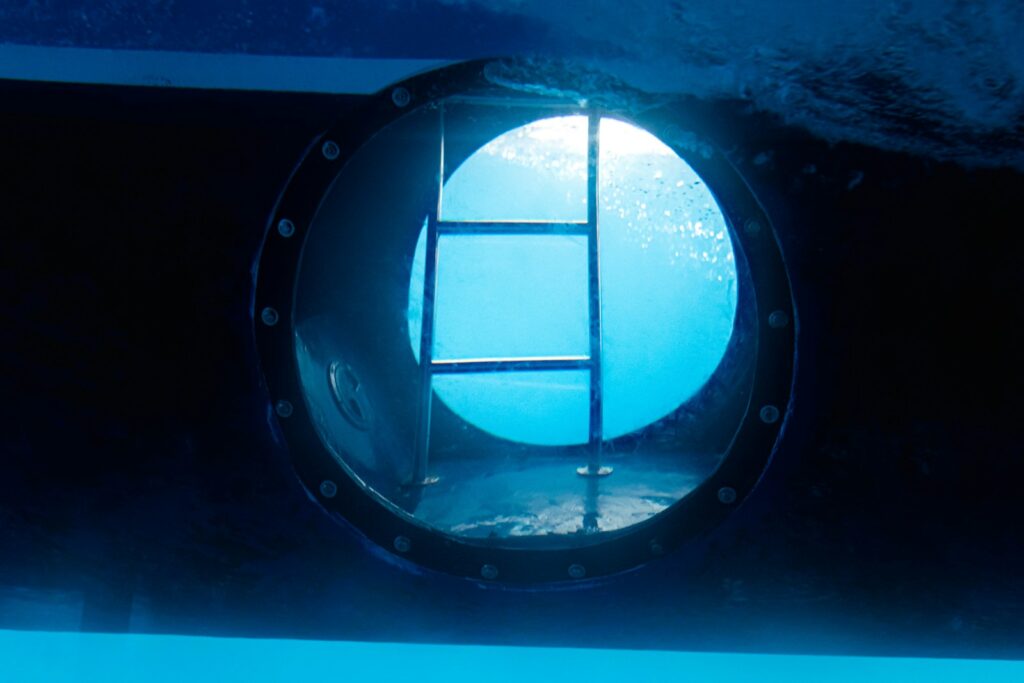 a round window in the side of a boat