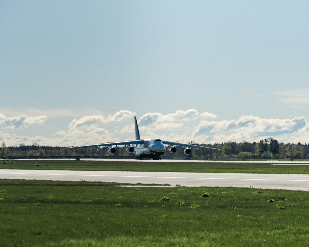 a large jetliner taking off from an airport runway