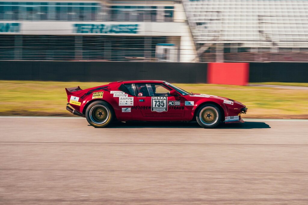 red porsche 911 on track field