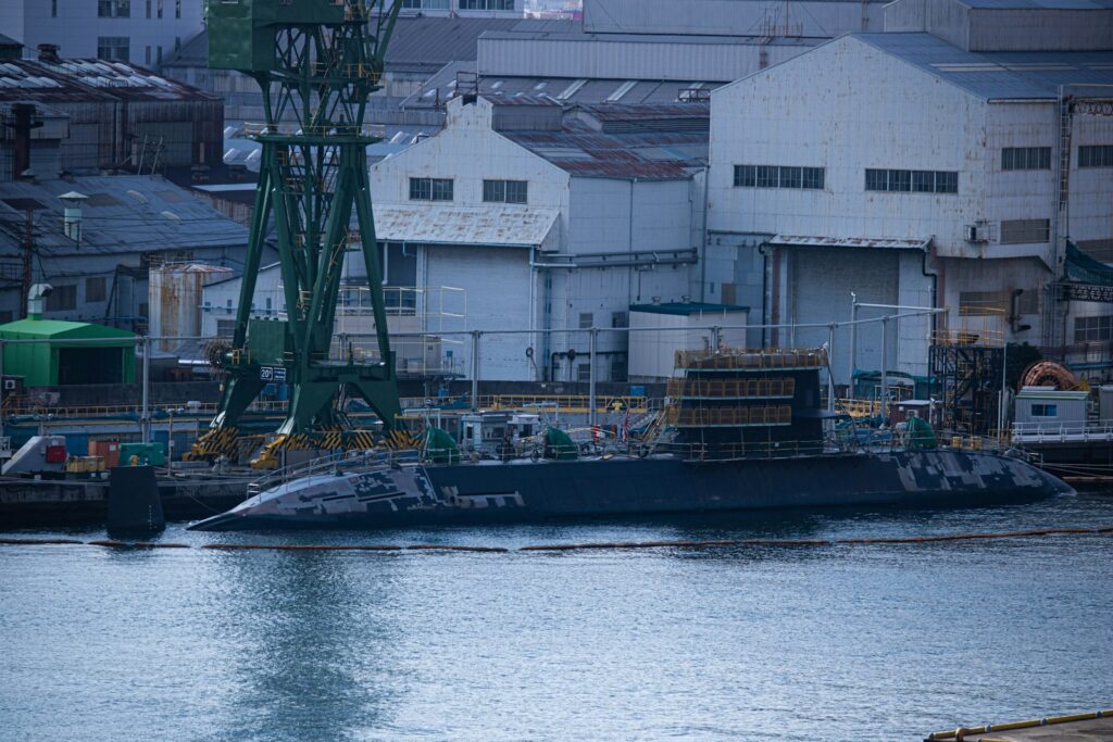 a large boat floating on top of a body of water
