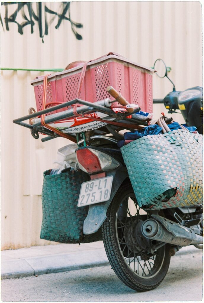 Motorcycle loaded with baskets and supplies