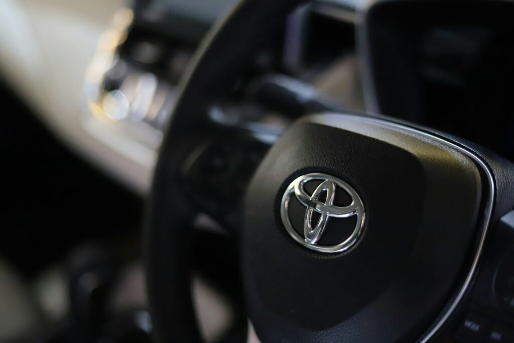 a close up of a steering wheel of a car