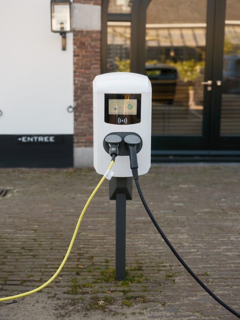 An electric vehicle charger is plugged in.