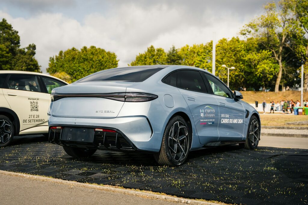 Two cars parked on the side of the road