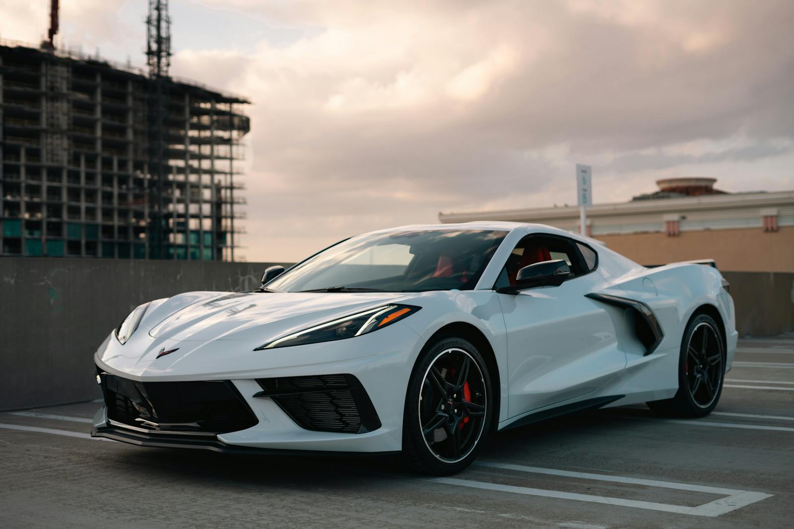 A Corvette, Four Parking Spots, and One Perfectly Petty Note