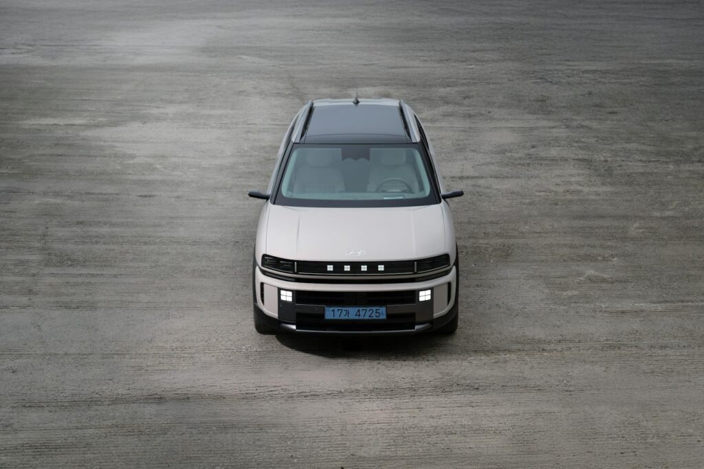 A Hyundai fuel cell vehicle parked outdoors showcasing modern design and clean energy technology.