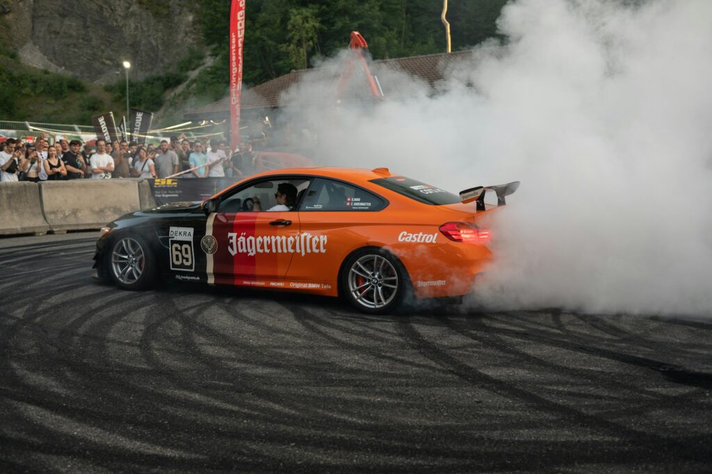 Drifting car creating a large cloud of smoke