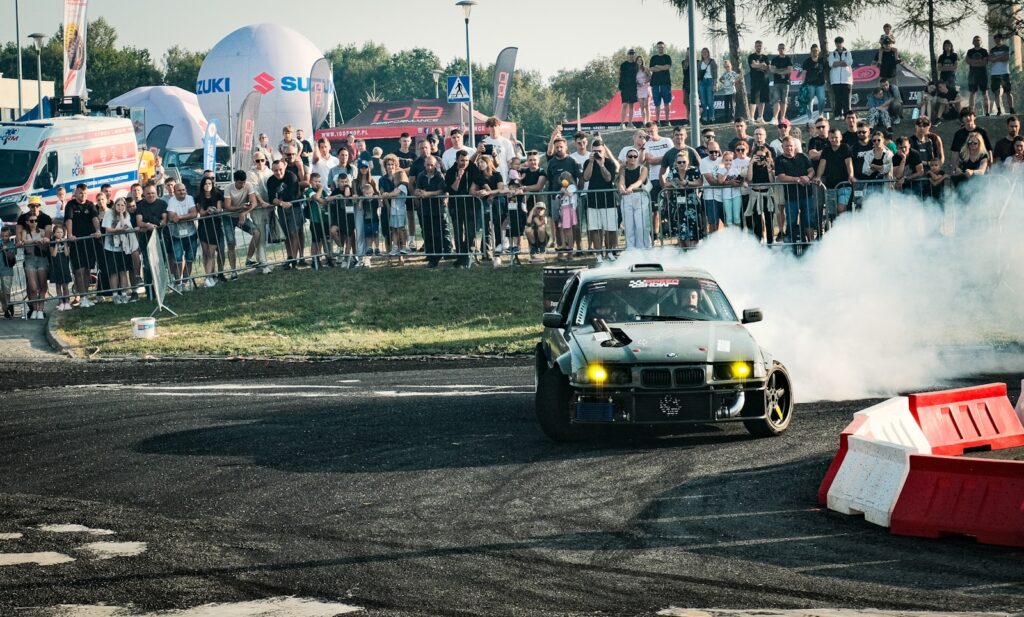 A couple of cars that are in the dirt