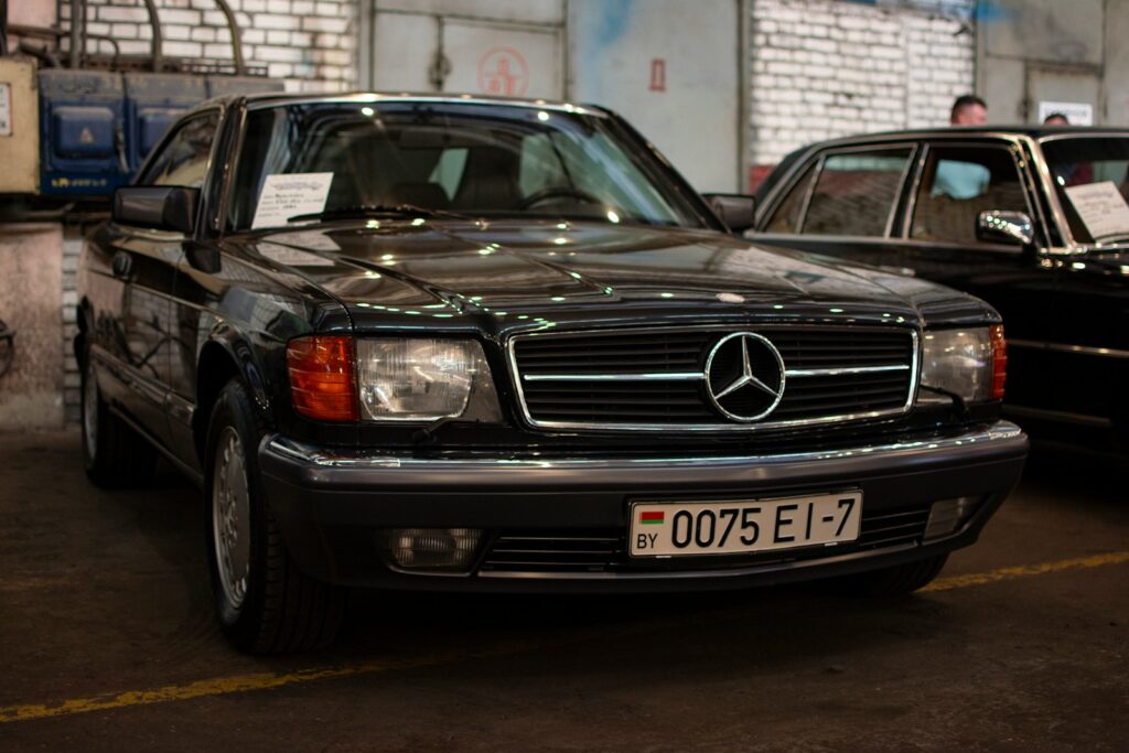 a black car parked in a parking lot