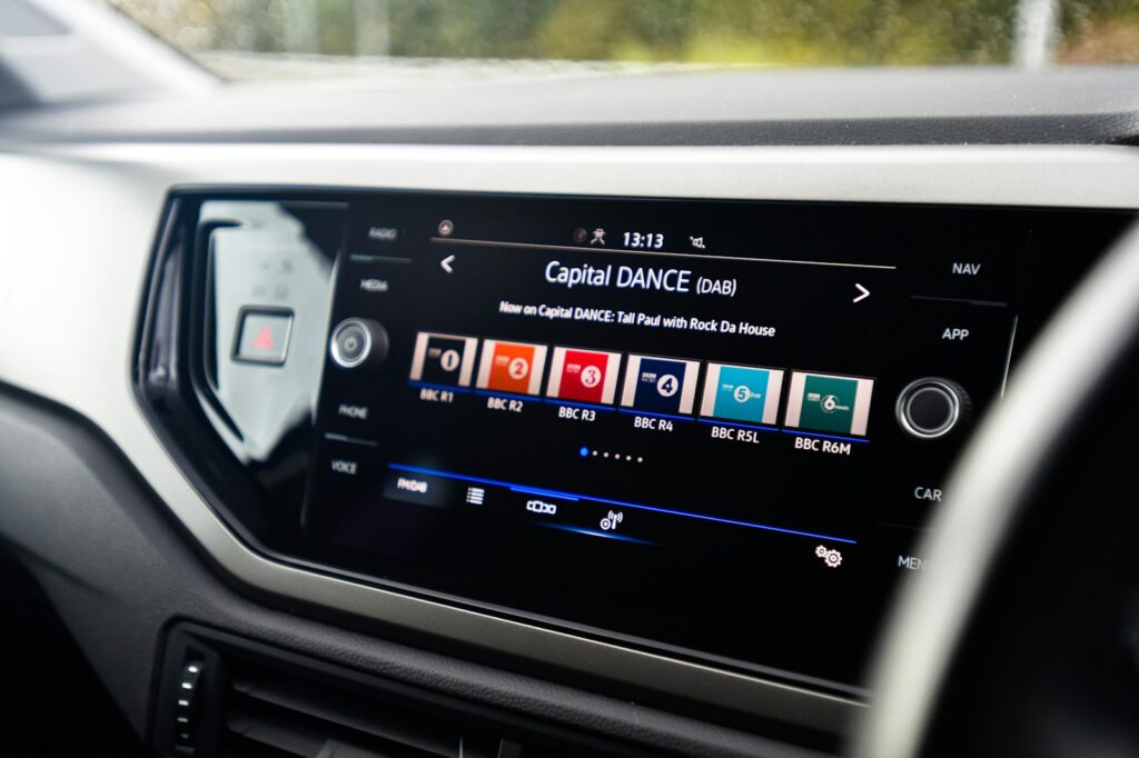 the dashboard of a car with a digital display