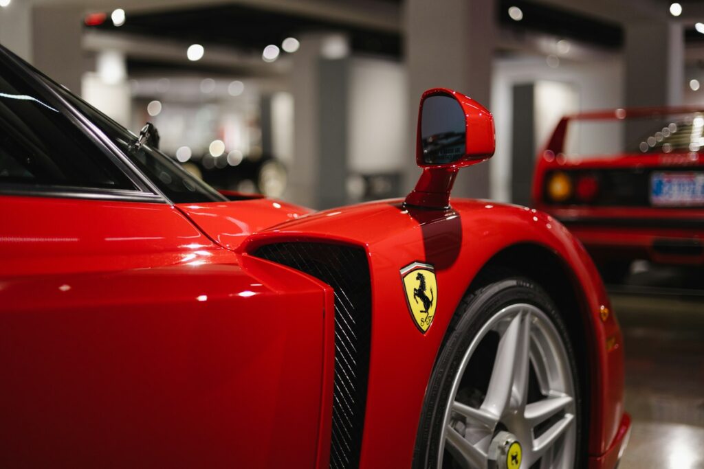 a red sports car parked in a garage
