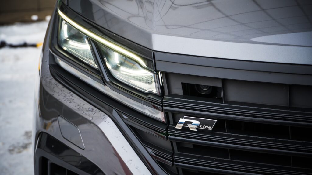 Close-up of a modern grey car's front grille.