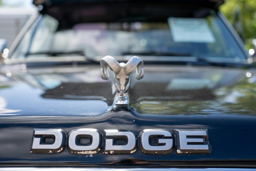 Close-up of vintage Dodge car hood with iconic ram ornament and logo in Nelson, Wisconsin.