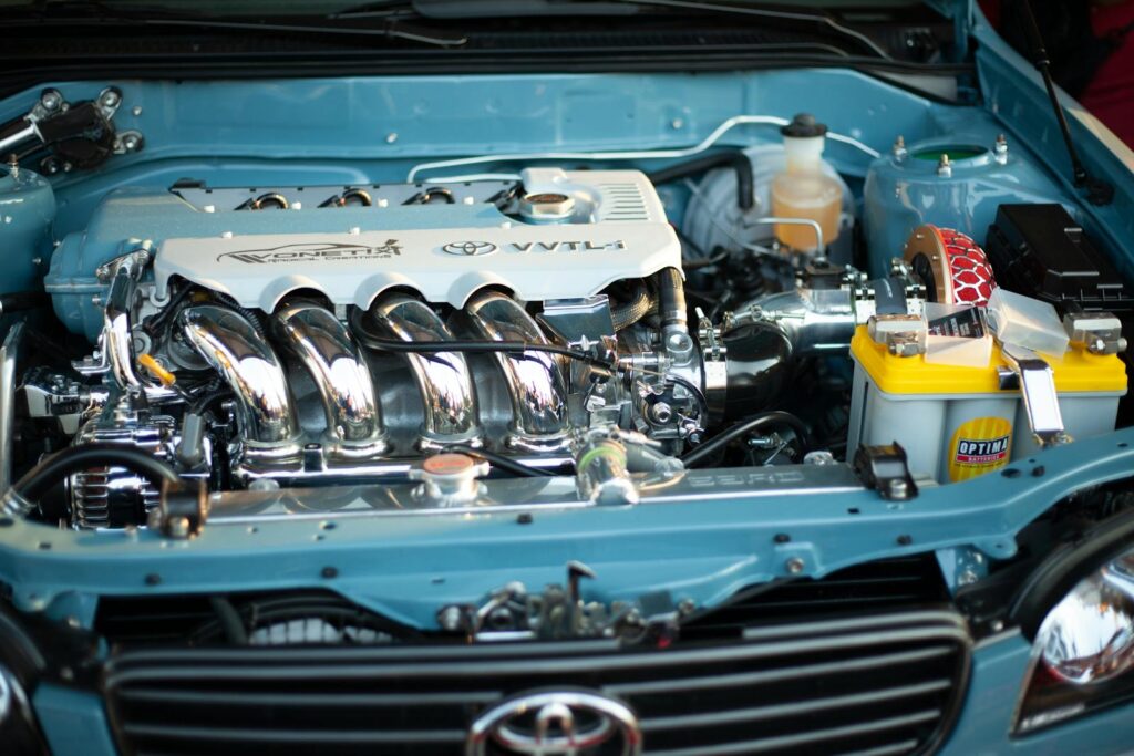 Detailed view of a shiny and powerful Toyota engine, showcasing automotive engineering.