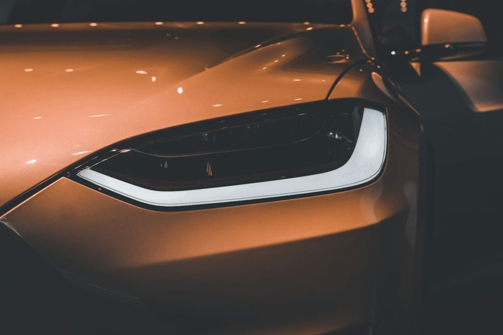 orange and black car in close up photography