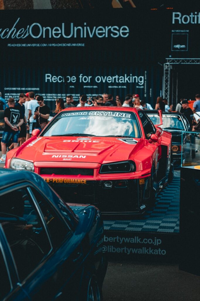 a group of cars parked next to each other in a parking lot