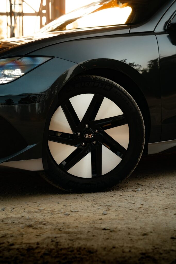 a close up of a car tire on a road