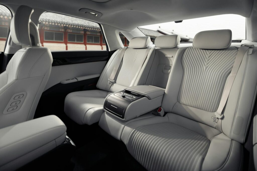 Elegant and spacious car interior featuring premium leather seats in a modern luxury sedan.