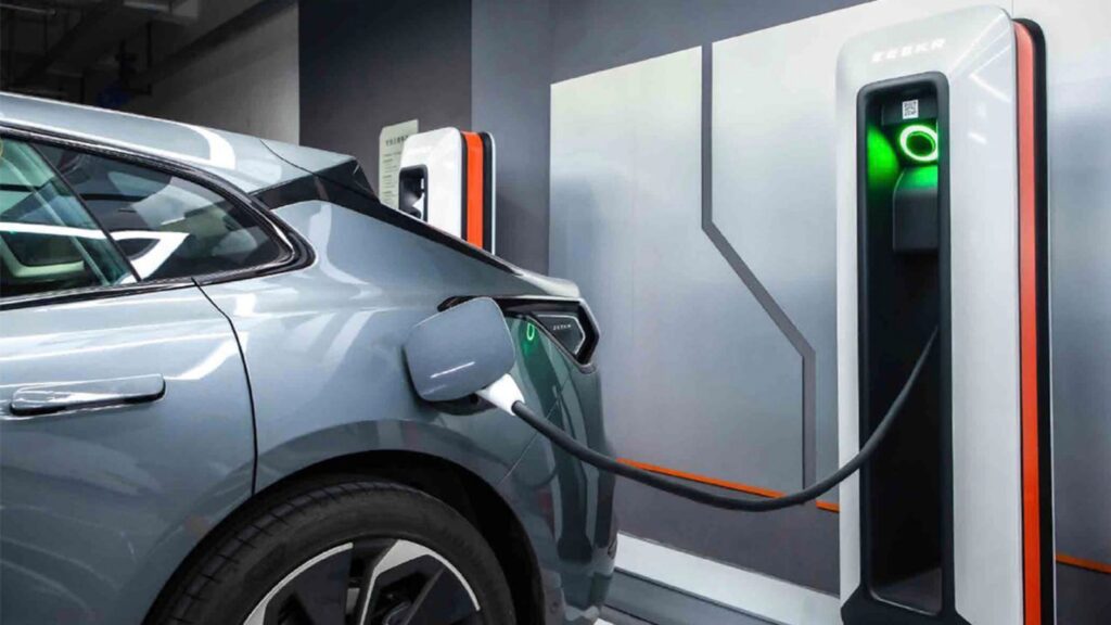 An electric car being charged at a charging station