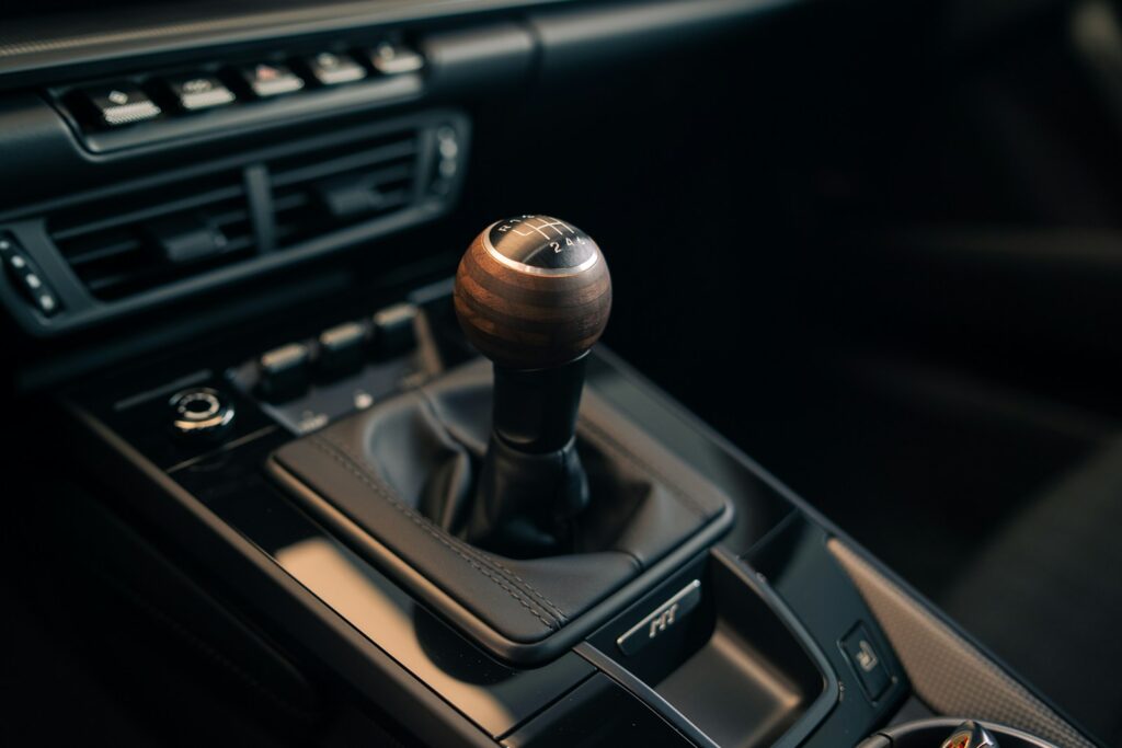 Car's manual shift lever on the console.