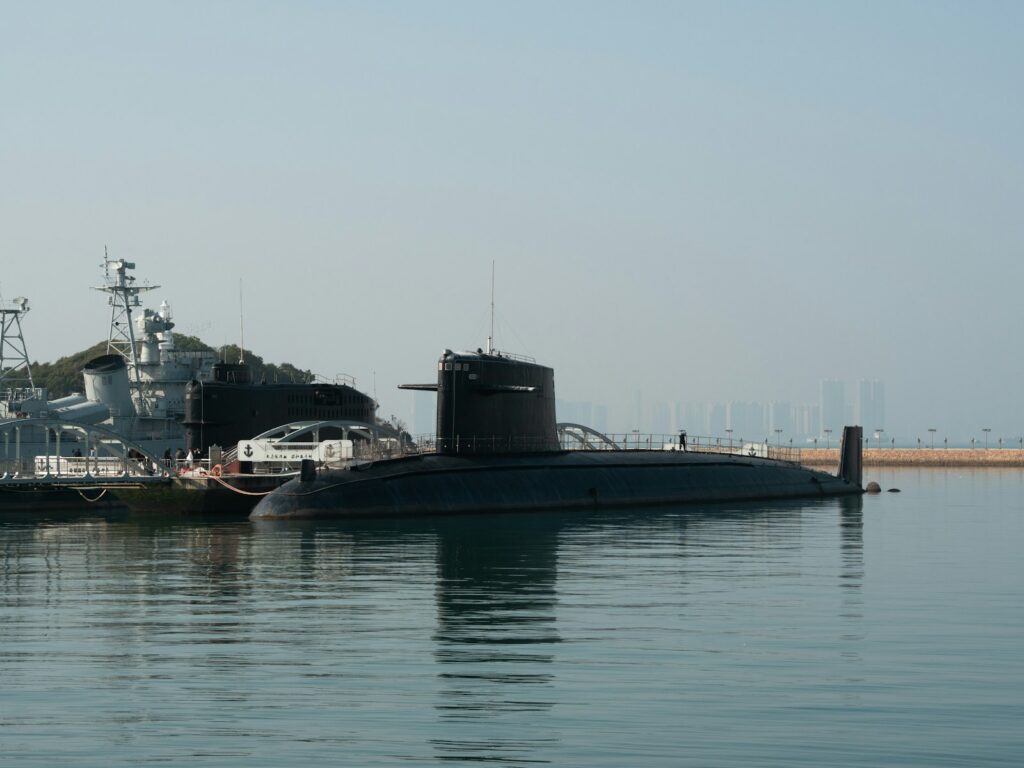 A submarine sitting in the middle of a body of water