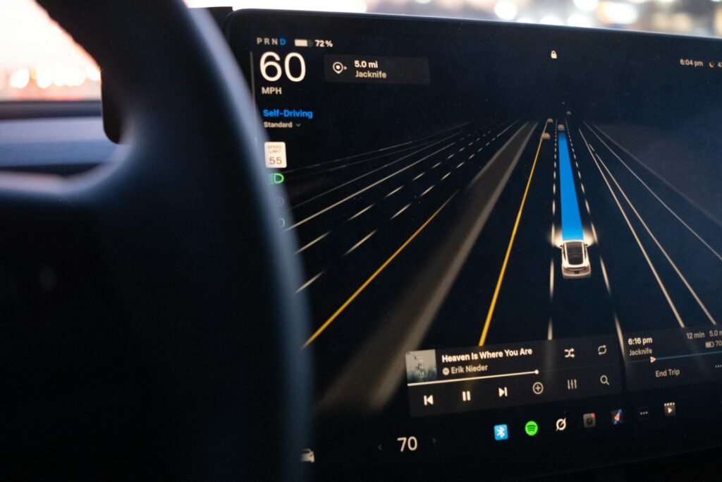 Car dashboard displaying autonomous driving interface