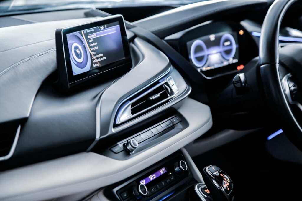 Luxury car interior showcasing advanced dashboard technology and sleek design elements.