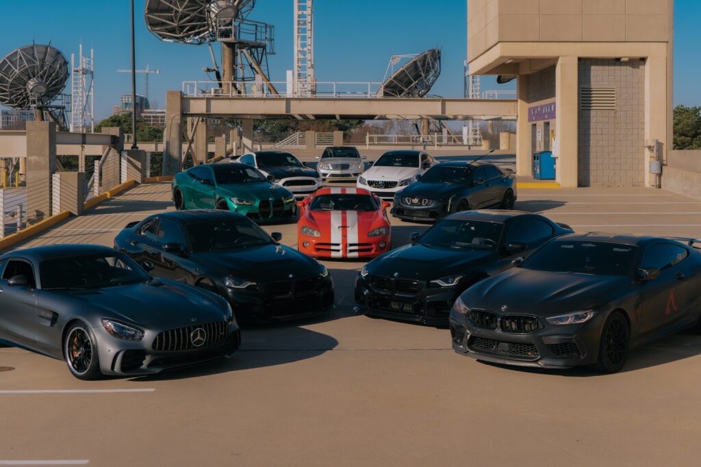 A bunch of cars parked in a parking lot