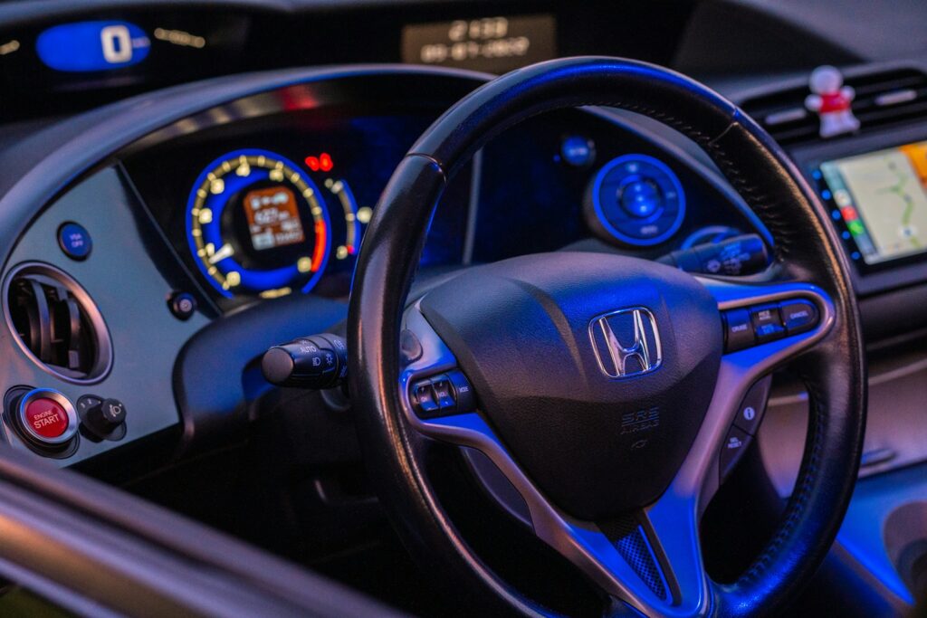 a steering wheel and dashboard of a car
