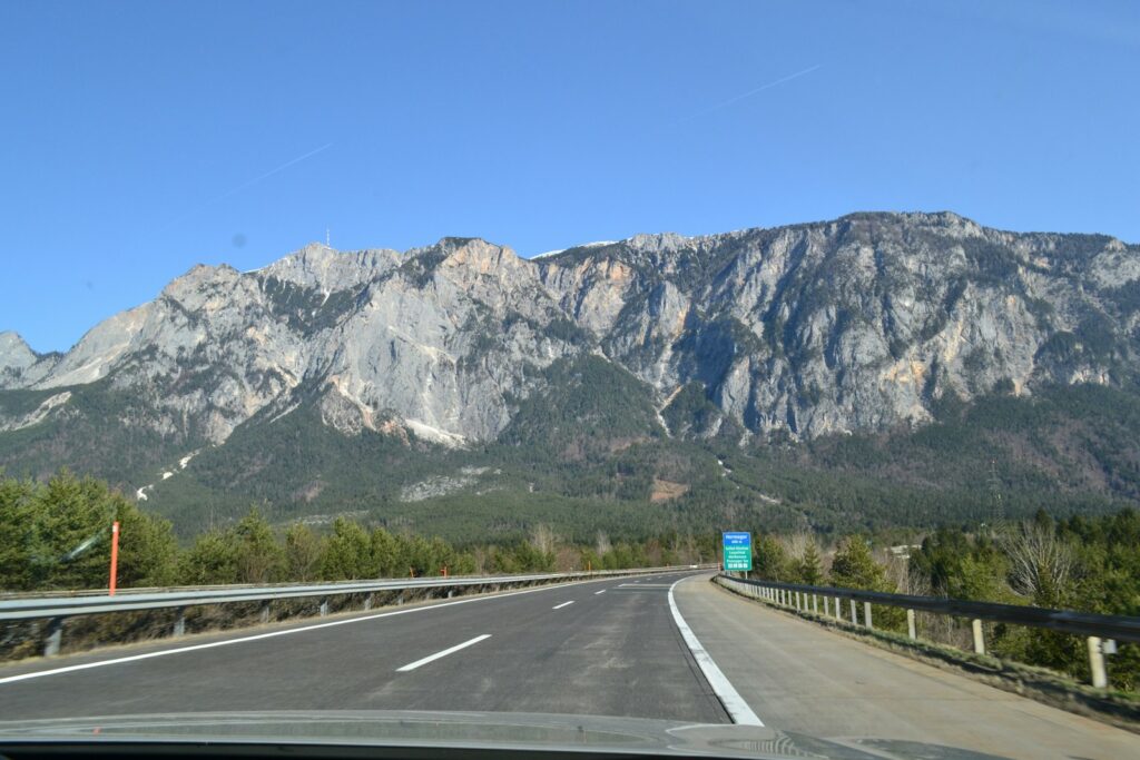 Highway leading to a majestic mountain range