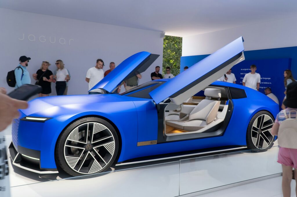 A blue concept car is on display.