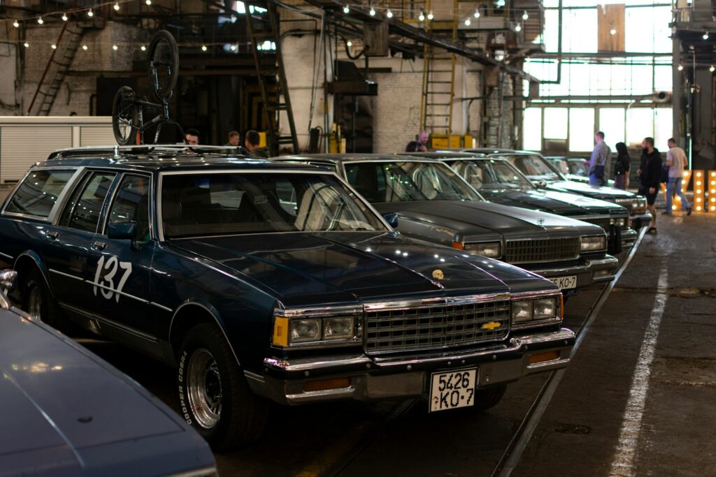 a row of cars parked in a parking lot