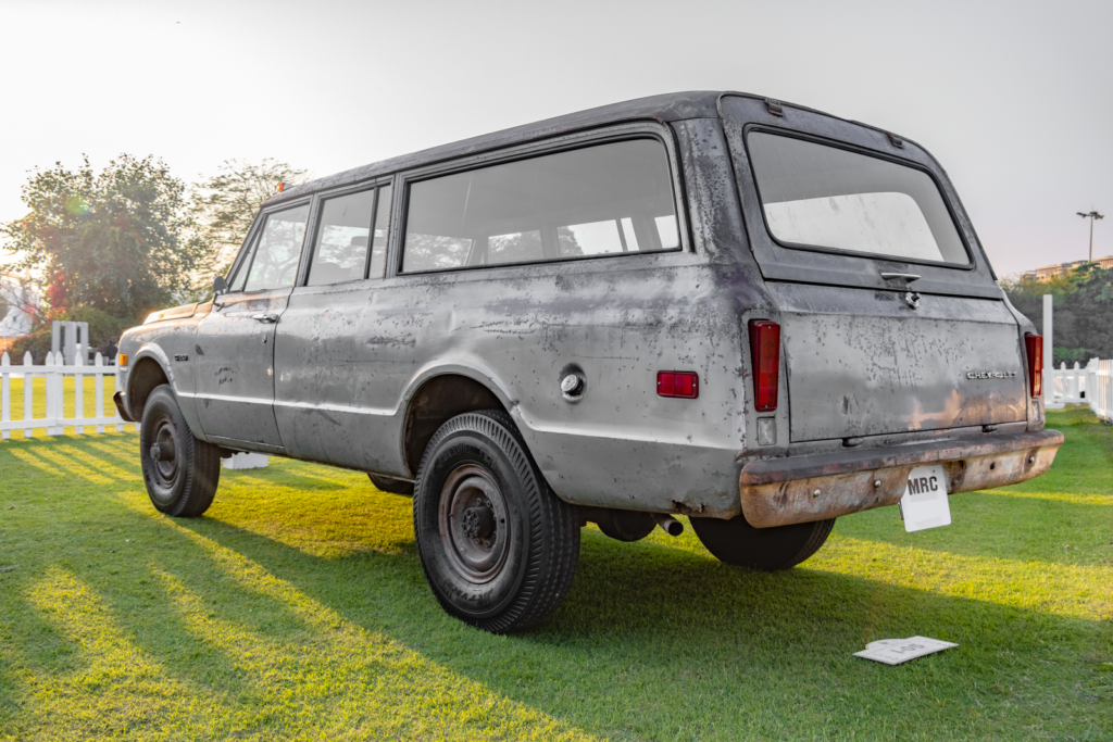 Classic Chevrolet Suburban C10 displayed outdoors in Gurugram. Perfect for car enthusiasts.