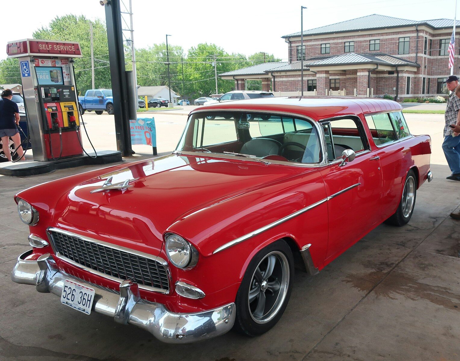a red car parked on a street