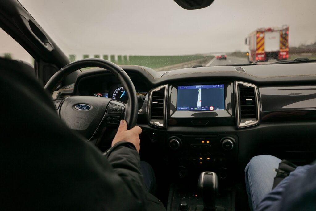Interior view of driving a Ford with navigation system on a highway near Zagreb, Croatia.