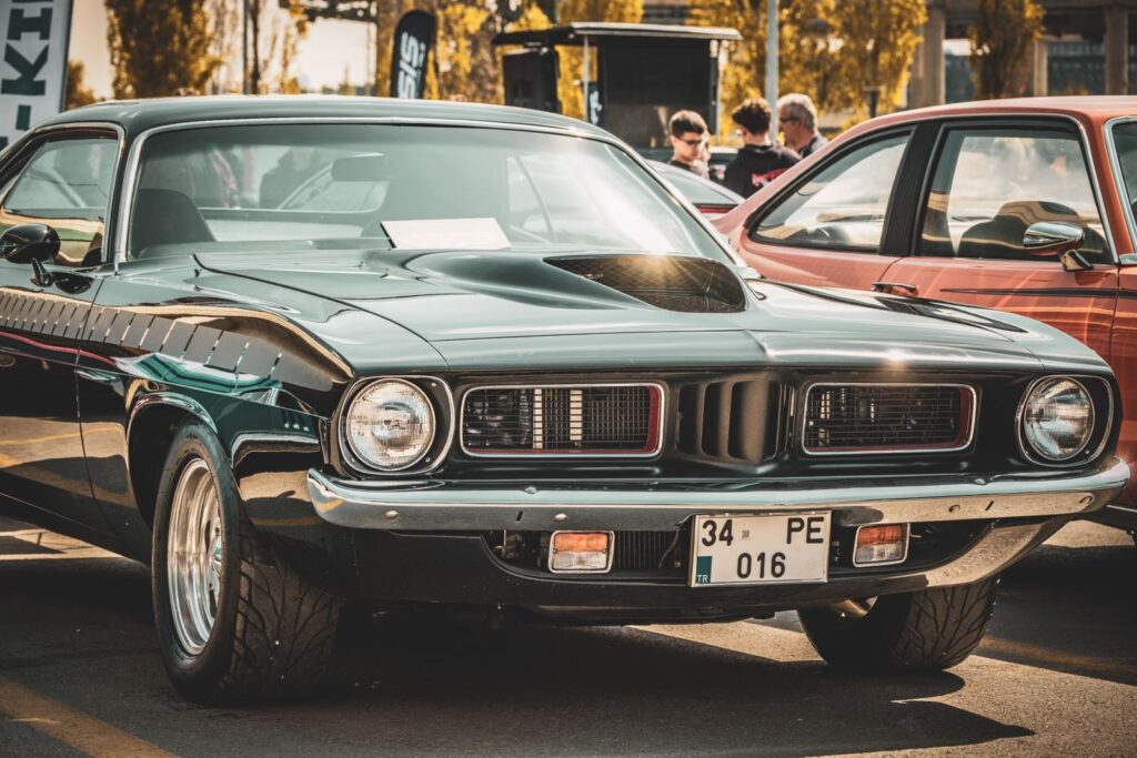 A vintage muscle car displayed outdoors at a car show in Ankara, Türkiye.