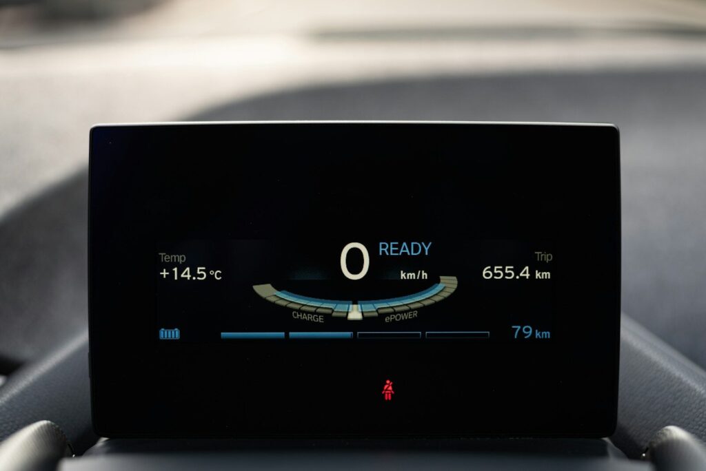 a black rectangular device with a screen