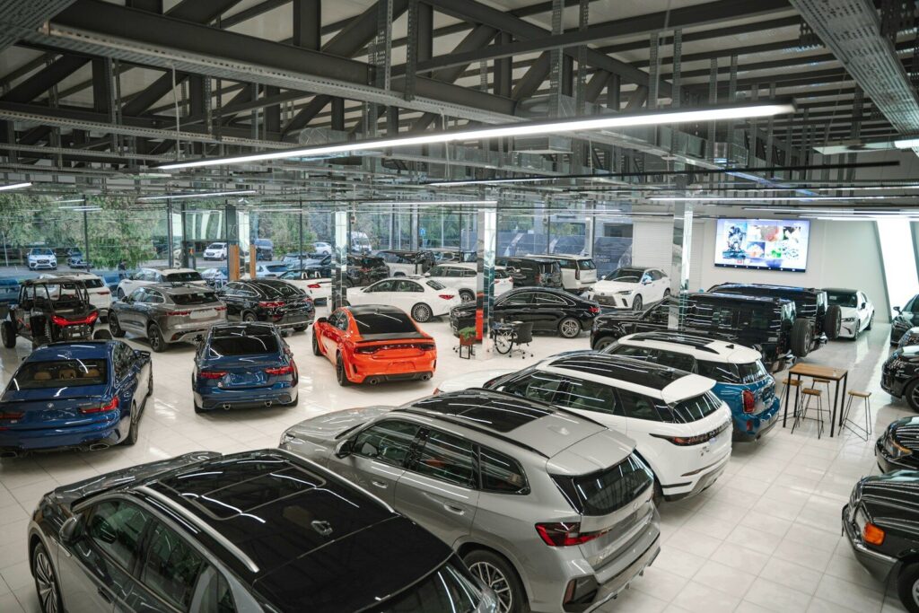 a bunch of cars are parked in a garage