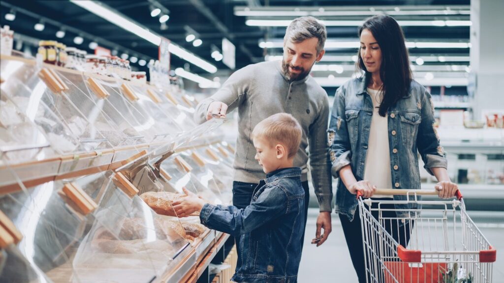 Family is shopping at a grocery store