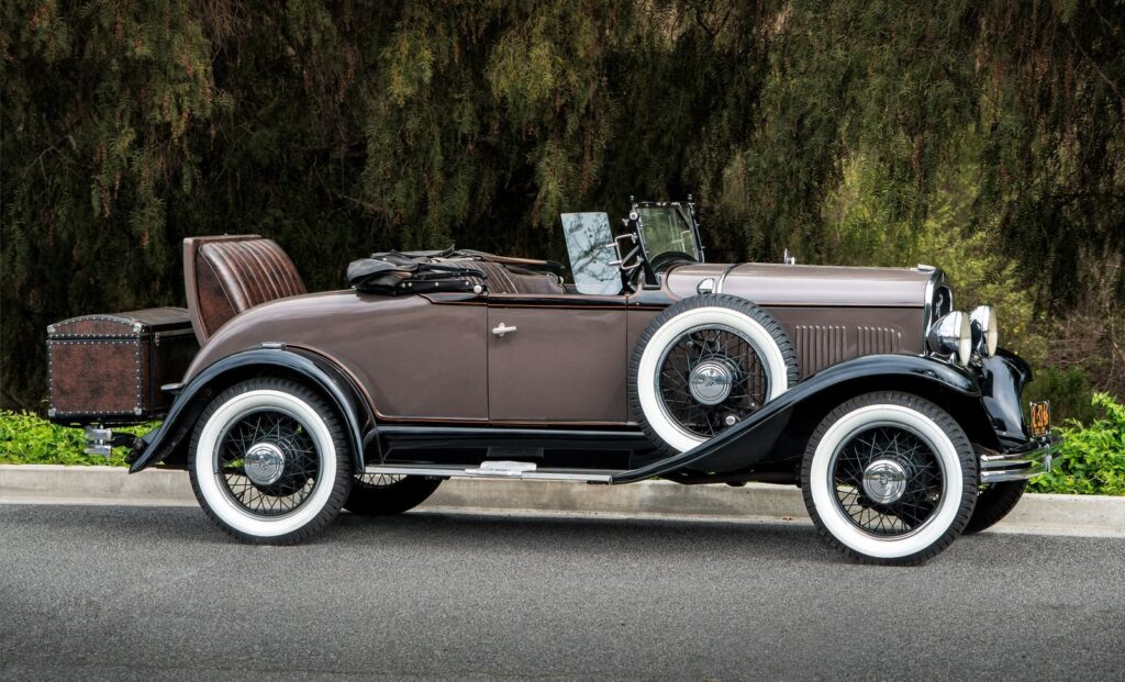 Classic brown convertible parked outdoors with vintage charm in Laguna Niguel, CA.