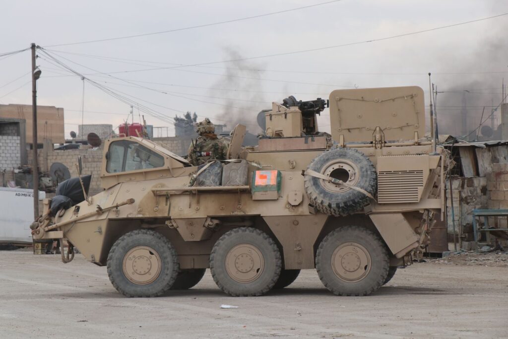 A military vehicle in an urban conflict environment in Al Hasakah, Syria.