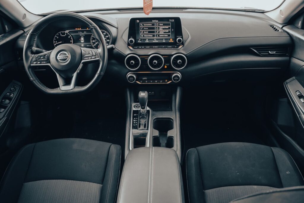 Explore the luxurious interior of a Nissan vehicle, highlighting the modern design and touchscreen features.