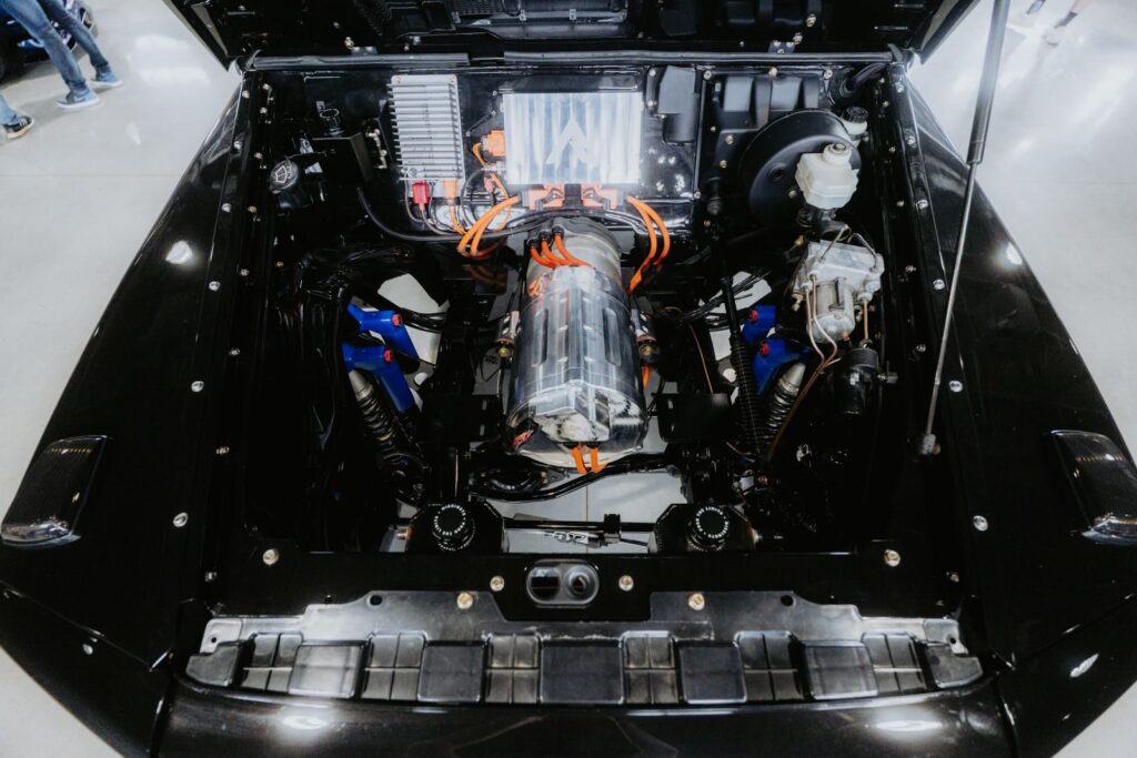 Top view of a modern electric car engine showcasing technical components and design.