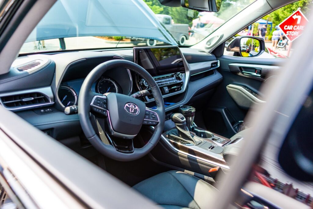 A sleek and modern car interior showcasing a Toyota dashboard with advanced features.